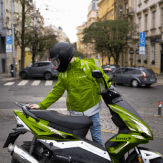 courier next to scooter